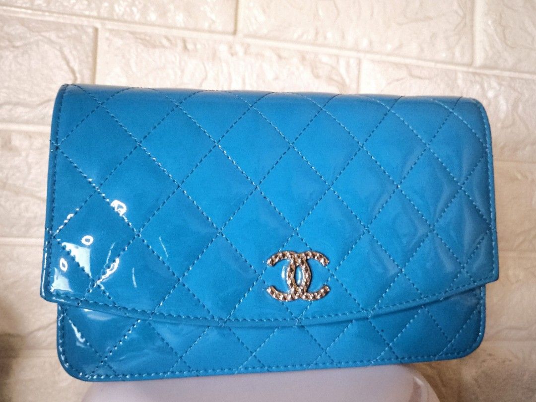 Chanel Wallet on Chain (Category: Luxury Bags & Wallets) located in Manila. Submitted by declutterwithme__ (Listing ID 1298079346, Image 2). Description: Chanel Wallet on Chain Perfect Patent Leather Condition 9/10 condition super nice color not bright blue!! Comes with Authenticity Card, Hologram and Dustbag.