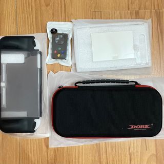 Dobe Nintendo Switch Protective Storage Bag and plastic Gray case slim body  transaprent casing housing with skull & Co button Caps