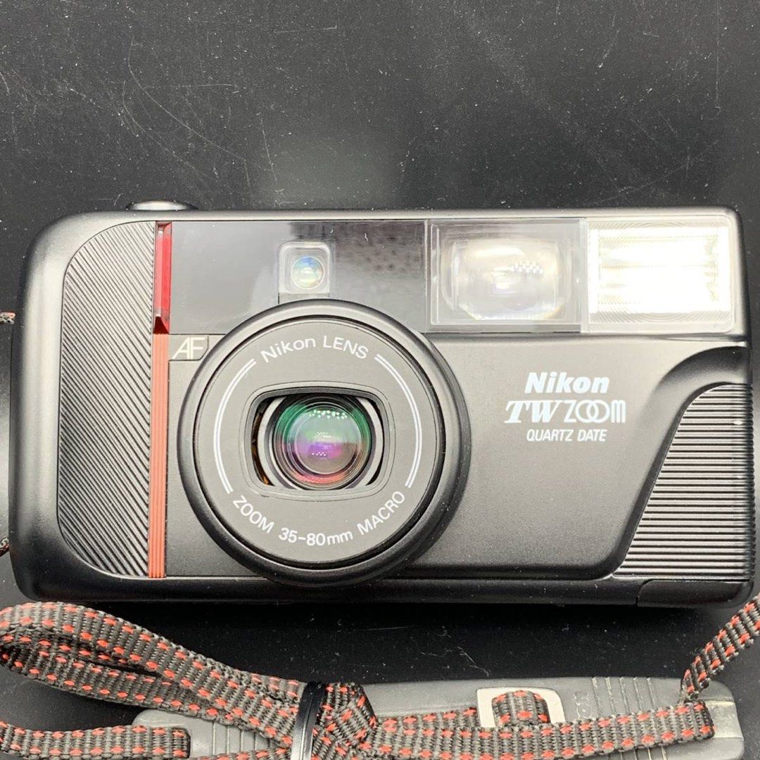 Nikon TW Zoom Film Camera (Category: Cameras) located in Quezon City. Submitted by thisisxydesu (Listing ID 1297962501, Image 2). Description: Nikon TW Zoom Film Camera with bag No issue. Ready to use with battery + bag Payment first via bank transfer or GCash. Meetup within Fairview QC only. (Please note: no return, no exchange once item is sold).