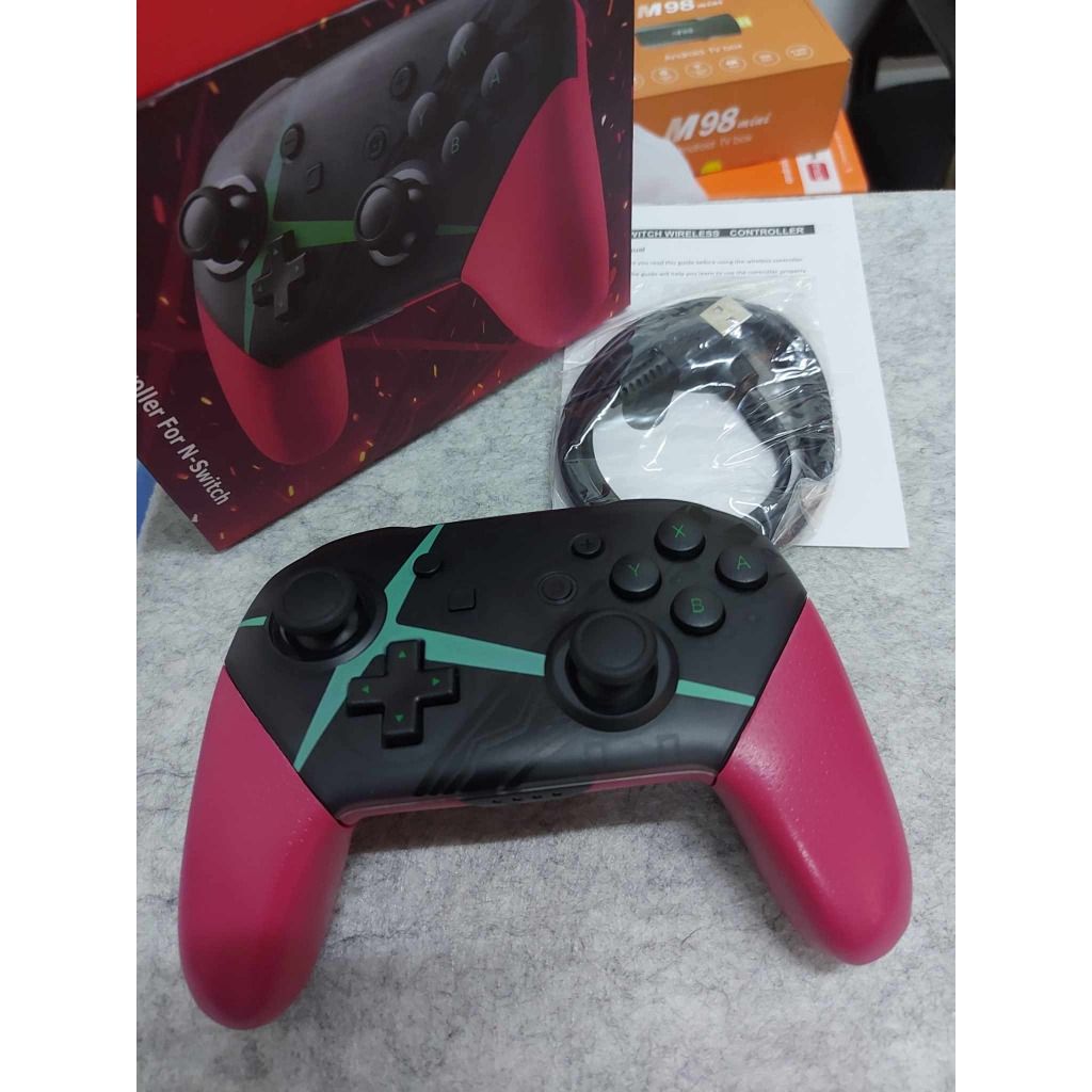 Nintendo Switch Pro Controller - Xenoblade Chronicles 2 Edition (Category: Nintendo) located in Manila. Submitted by sdfsolutions (Listing ID 1298102605, Image 1). Description: Introduction: Take your Xenoblade Chronicles 2 sessions up a notch with this Special Edition Xenoblade Chronicles 2 Nintendo Switch Pro Controller. This controller includes many of the great features found in the Joy-Con Controllers: motion controls, HD rumble, built-in am