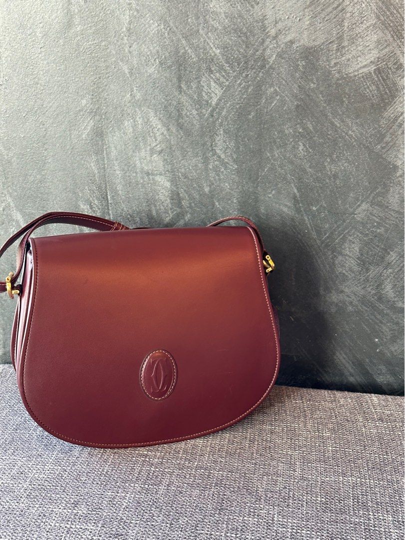 Vintage Cartier Sling Bag (Category: Luxury Bags & Wallets) located in Batangas. Submitted by kulilayfinds (Listing ID 1297981915, Image 1). Description: Inclusion : dustbag and authenticity card Strap is adjustable. Can be worn as a shoulder bag or cross body bag..