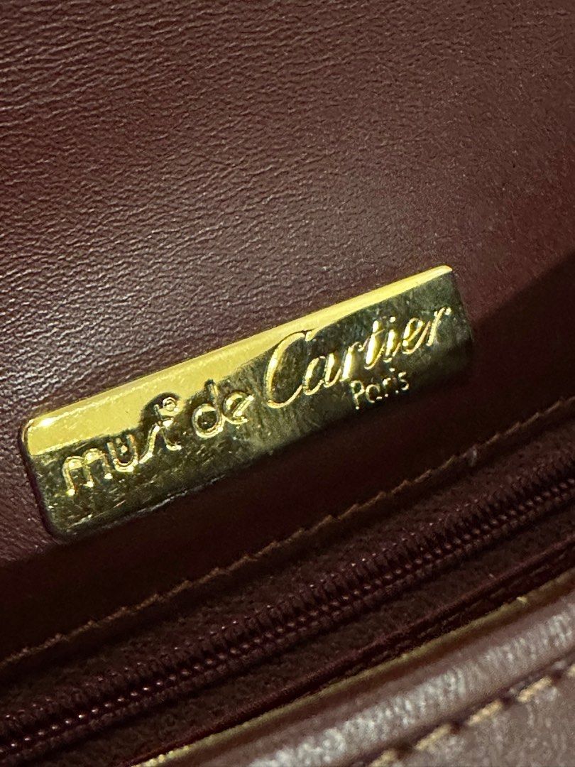 Vintage Cartier Sling Bag (Category: Luxury Bags & Wallets) located in Batangas. Submitted by kulilayfinds (Listing ID 1297981915, Image 2). Description: Inclusion : dustbag and authenticity card Strap is adjustable. Can be worn as a shoulder bag or cross body bag..