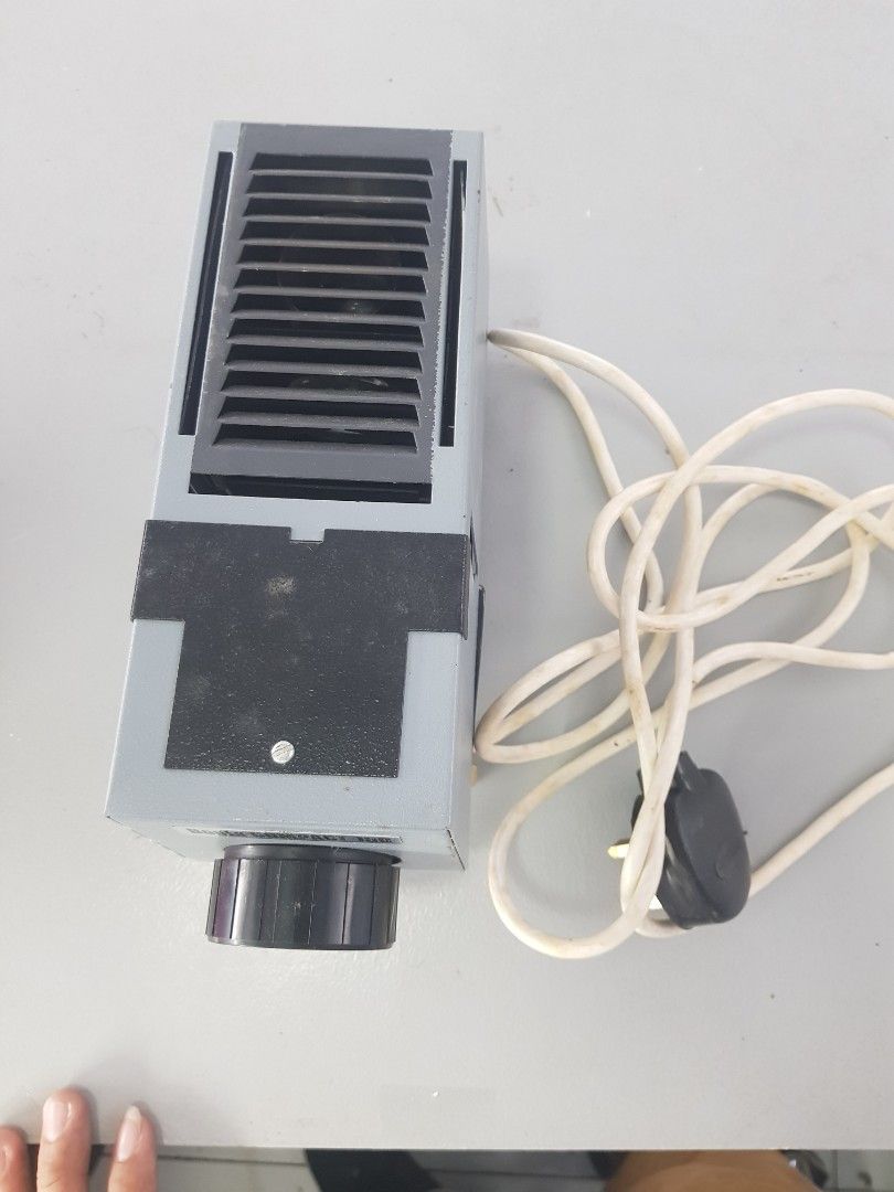 Vintage slide projector(works) (Category: Projectors) located in Dagupan City. Submitted by yunitsjay (Listing ID 1297997339, Image 2). Description: vintage compact 150 slide projector with box.
