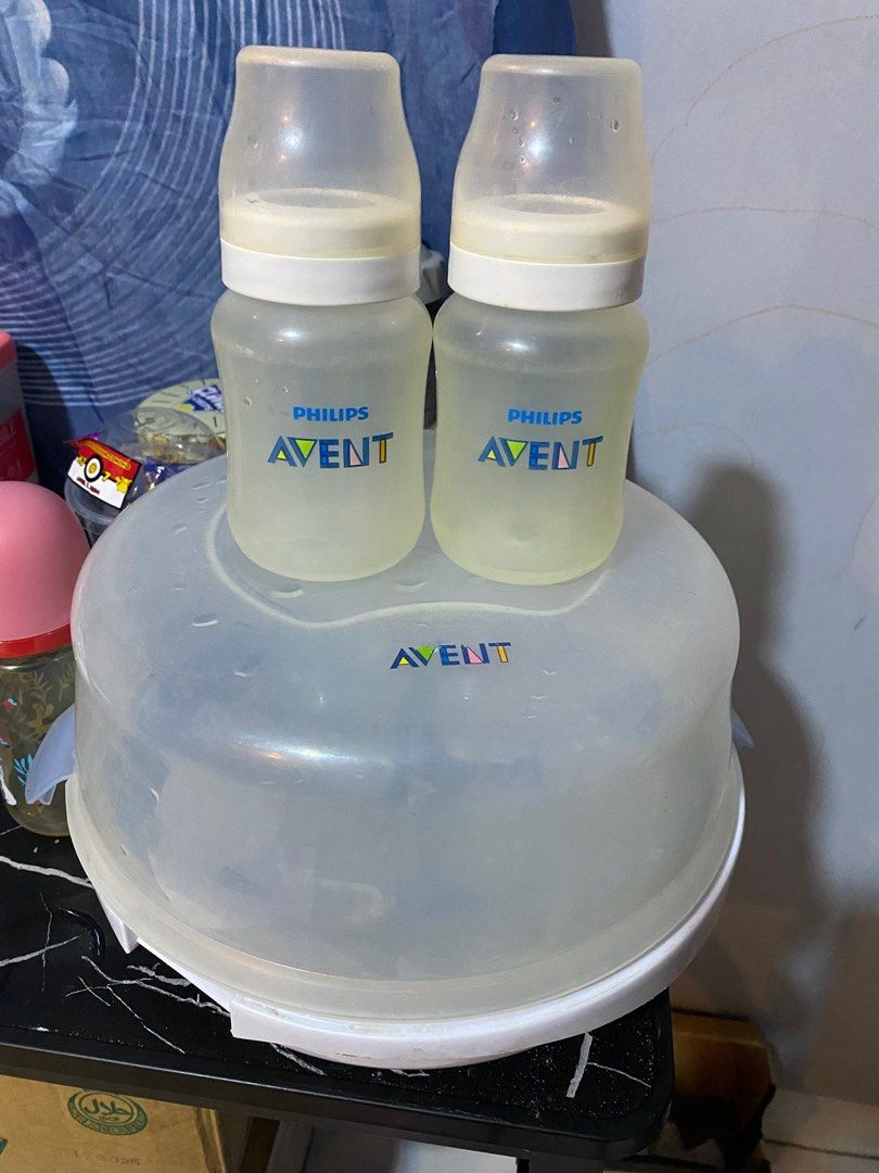 Avent Bottles and Microwave Steam Sterilizer (Category: Breastfeeding & Bottle Feeding) located in Marikina City. Submitted by jewelklein08 (Listing ID 1298158765, Image 1). Description: .