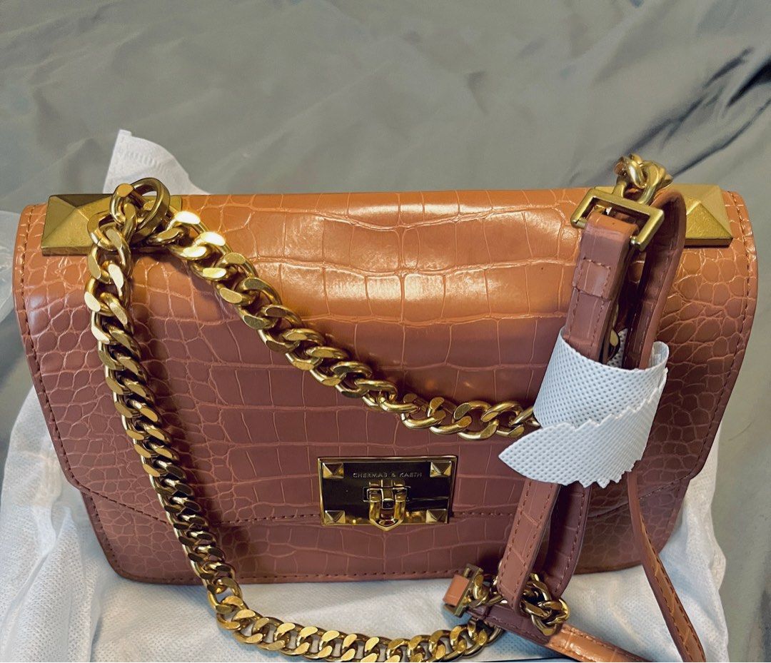 Brown Sling Bag w/ Gold Chain (Category: Sling Bags) located in Pasig City. Submitted by wangderfulworld (Listing ID 1298278450, Image 3). Description: 𝘽𝙧𝙖𝙣𝙙 𝙣𝙚𝙬 𝙃𝙆 𝙗𝙧𝙖𝙣𝙙𝙚𝙙 (𝘾𝙣𝙆 𝙞𝙣𝙨𝙥𝙞𝙧𝙚𝙙) 𝖶𝗂𝗍𝗁 𝗍𝖺𝗀 𝖺𝗇𝖽 𝖽𝗎𝗌𝗍 𝖻𝖺𝗀 𝖢𝗋𝗈𝖼𝗈𝖽𝗂𝗅𝖾 𝖯𝖴 𝗅𝖾𝖺𝗍𝗁𝖾𝗋 𝗆𝖺𝗍𝖾𝗋𝗂𝖺𝗅 𝖬𝗎𝗅𝗍𝗂𝗉𝗅𝖾 𝖼𝗈𝗆𝗉𝖺𝗋𝗍𝗆𝖾𝗇𝗍𝗌 𝖠𝖽𝗃𝗎𝗌𝗍𝖺𝖻𝗅𝖾 𝗌𝗅𝗂𝗇𝗀 𝖦𝗈𝗅𝖽 𝗁𝖺𝗋𝖽𝗐𝖺𝗋𝖾 P499 only 𝘗𝘈𝘠𝘔𝘌𝘕𝘛 𝘍𝘐𝘙𝘚𝘛 + �