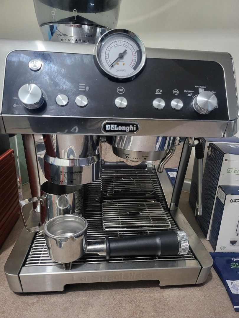 Delonghi La Specialista (Category: Coffee Machines & Makers) located in Pasig City. Submitted by rakel10 (Listing ID 1298175896, Image 3). Description: Delonghi La Specialista bought mid year of 2023. Slightly used and in good condition. ❗️still negotiable❗️ Freebies: ✔️2- Eco Decalk Product Details 1) Slightly used 2) Delivers the perfect dose of freshly ground coffee for maximum flavour in every cup 3) Consistent tamping, with no effort and no 
