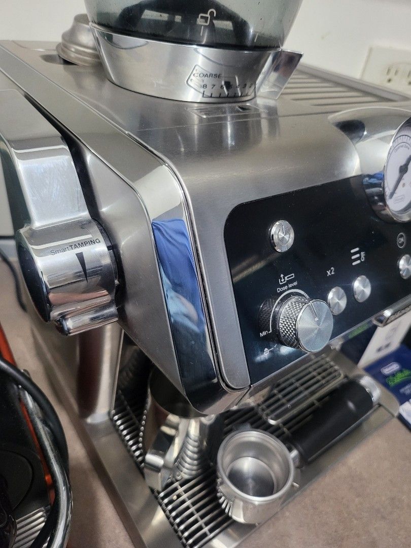 Delonghi La Specialista (Category: Coffee Machines & Makers) located in Pasig City. Submitted by rakel10 (Listing ID 1298175896, Image 2). Description: Delonghi La Specialista bought mid year of 2023. Slightly used and in good condition. ❗️still negotiable❗️ Freebies: ✔️2- Eco Decalk Product Details 1) Slightly used 2) Delivers the perfect dose of freshly ground coffee for maximum flavour in every cup 3) Consistent tamping, with no effort and no 