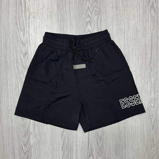 Essentials Running Shorts Embroidered above the knee with pockets