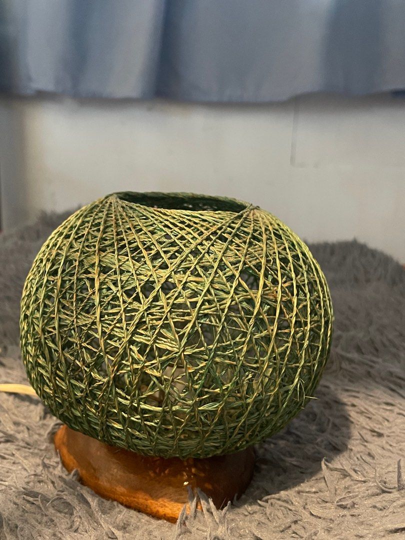 Green Native Abaca Table Lamp (Category: Lighting) located in Makati City. Submitted by ms.bgss (Listing ID 1298198440, Image 3). Description: Preloved table bedroom lamp made from native abaca dyed in green color with wooden stand • properly working; comes with free spare bulbs • cute !! • PM :).