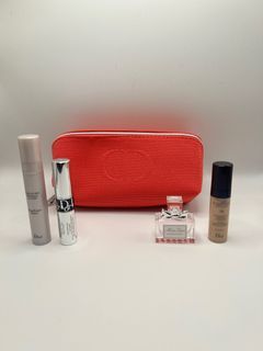 Pink pouch with makeup products