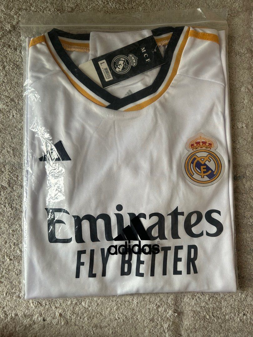 Real Madrid Jersey 2023/24 (Category: Activewear) located in Singapore. Submitted by premiumgoodss (Listing ID 1298178526, Image 1). Description: fits well for 175cm.