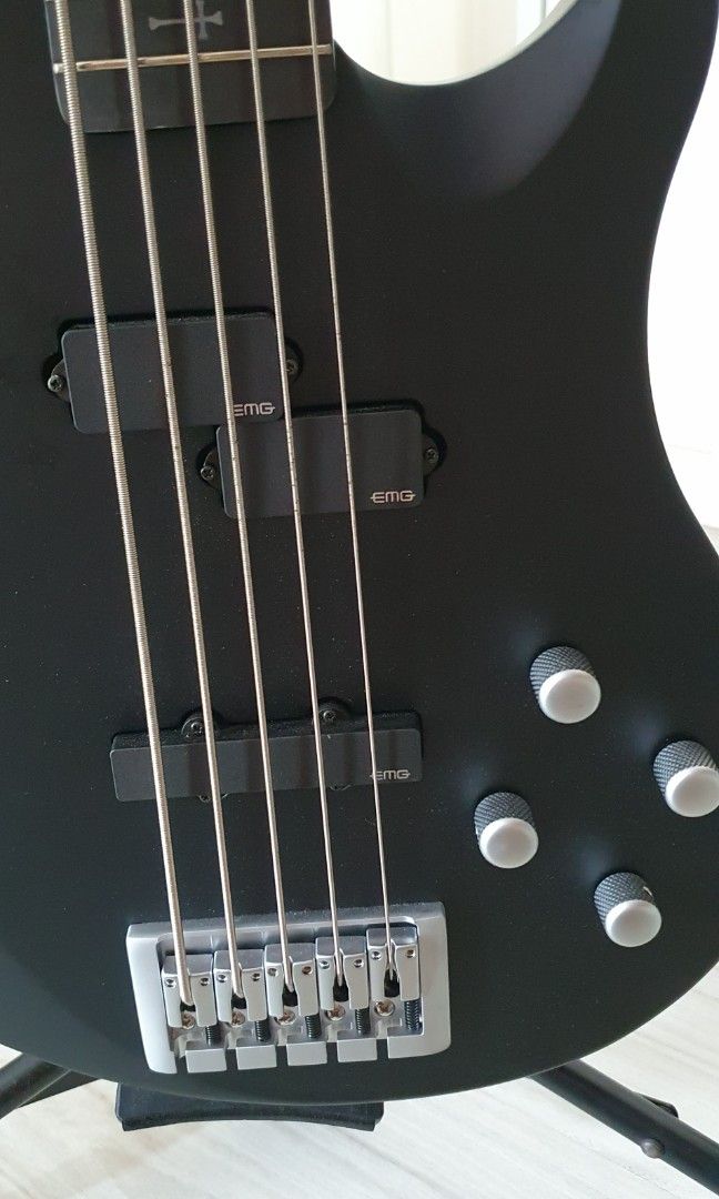 Schecter (Category: Musical Instruments) located in Kuala Lumpur. Submitted by kentyoonwen (Listing ID 1298165187, Image 3). Description: Model Name Johnny Christ-5 Bass Item Number 278 Guitar Colors Satin Black (SBK) Dexterity Right Handed Country of Origin South Korea Construction Bolt-on Body Material Ash Top Contour Flat Top Neck Material Maple 3-pc Fretboard Material Ebony Inlays Silver Bone Crosses w/Deathbat at 12th Fret Scale 35" (889mm) 