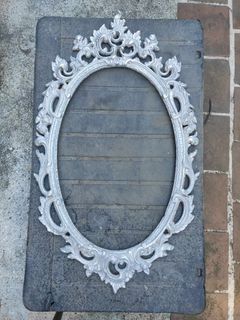 Vintage wall shelf  with ornate oval mirror frame
