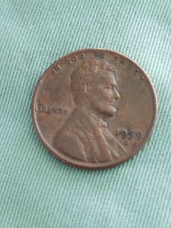 1959d Lincoln penny with small T on trust