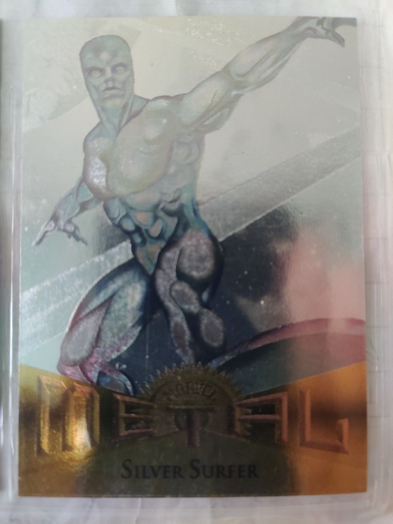 1995 Fleer Marvel Metal Flasher Silver Surfer (Category: Raw Singles) located in Kawit. Submitted by ryuko.matoi (Listing ID 1298360260, Image 1). Description: 1995 Fleer Marvel Metal Flasher Silver Surfer No reply means not interested No trade/swaps No reservation MOP - BDO & Cash Pick up location: Rosedale Residences, Barangay San Sebastian, Kawit Cavite..