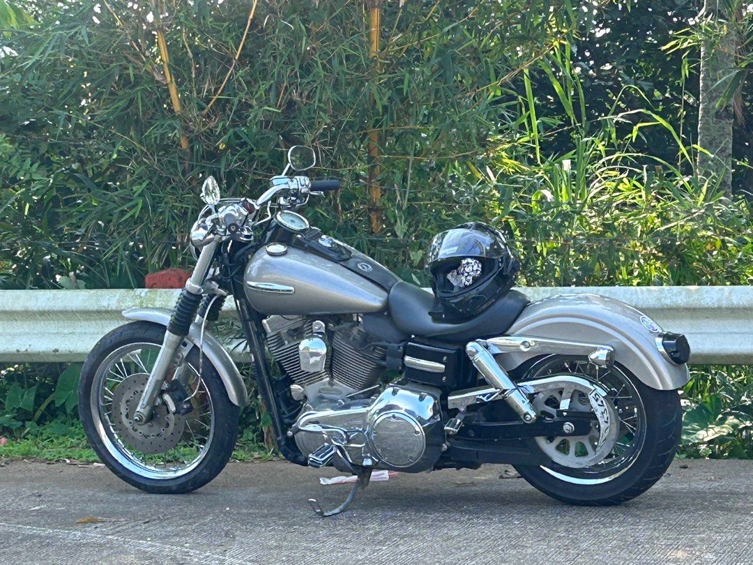 2007 Harley Davidson Dyna Superglide FXDC (Category: Motorbikes for Sale) located in Taguig. Submitted by sbmacion (Listing ID 1298375696, Image 3). Description: 2007 Dyna Superglide FXDC 96 cubic inches (1600 cc) after market chrome rims and rear suspensions, screaming eagle pipes, brand new battery, Pirelli Night Dragon tires 70%, <9k miles. Inclusions: Willy and Max saddle bags, original HD solo seat, forward controls. Complete papers and Shop