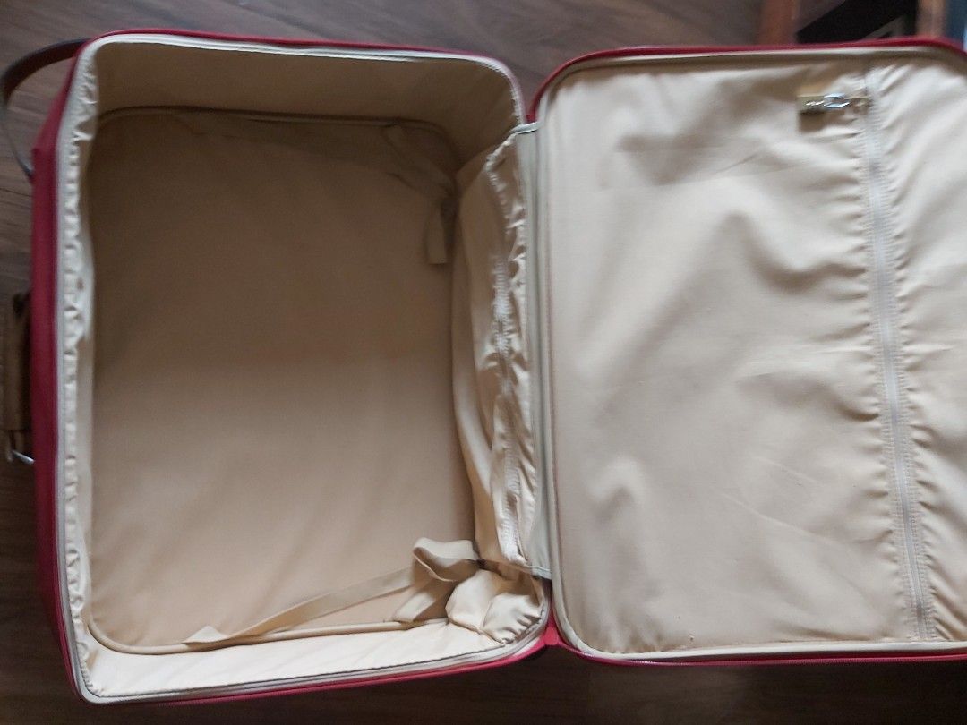 Authentic Lancel Luggage Two wheeled (Category: Luxury Bags & Wallets) located in Mandaluyong City. Submitted by j.alonso (Listing ID 1298391399, Image 3). Description: Authentic Lancel Luggage Two wheeled roller Heavy Leather handles Measures 27L x21L x8in Used 3x for travel. No rips or tears.