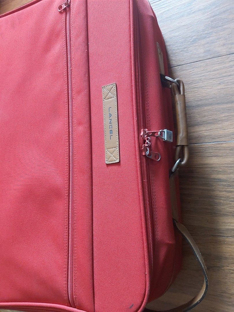 Authentic Lancel Luggage Two wheeled (Category: Luxury Bags & Wallets) located in Mandaluyong City. Submitted by j.alonso (Listing ID 1298391399, Image 1). Description: Authentic Lancel Luggage Two wheeled roller Heavy Leather handles Measures 27L x21L x8in Used 3x for travel. No rips or tears.