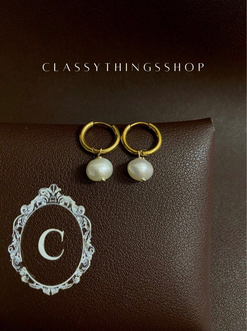 Freshwater Pearl-drop Earrings (Category: Earrings) located in Quezon City. Submitted by classythingsshop (Listing ID 1298352492, Image 2). Description: Freshwater Pearl-drop Earrings. Actual photo of the item. Materials: Freshwater pearls, 14/20 gold-filled wires, and stainless steel hoop earrings. All our items are high quality, nontarnish and hypoallergenic. Feel free to inquire anytime through our chat or use the number below as intended. Tha