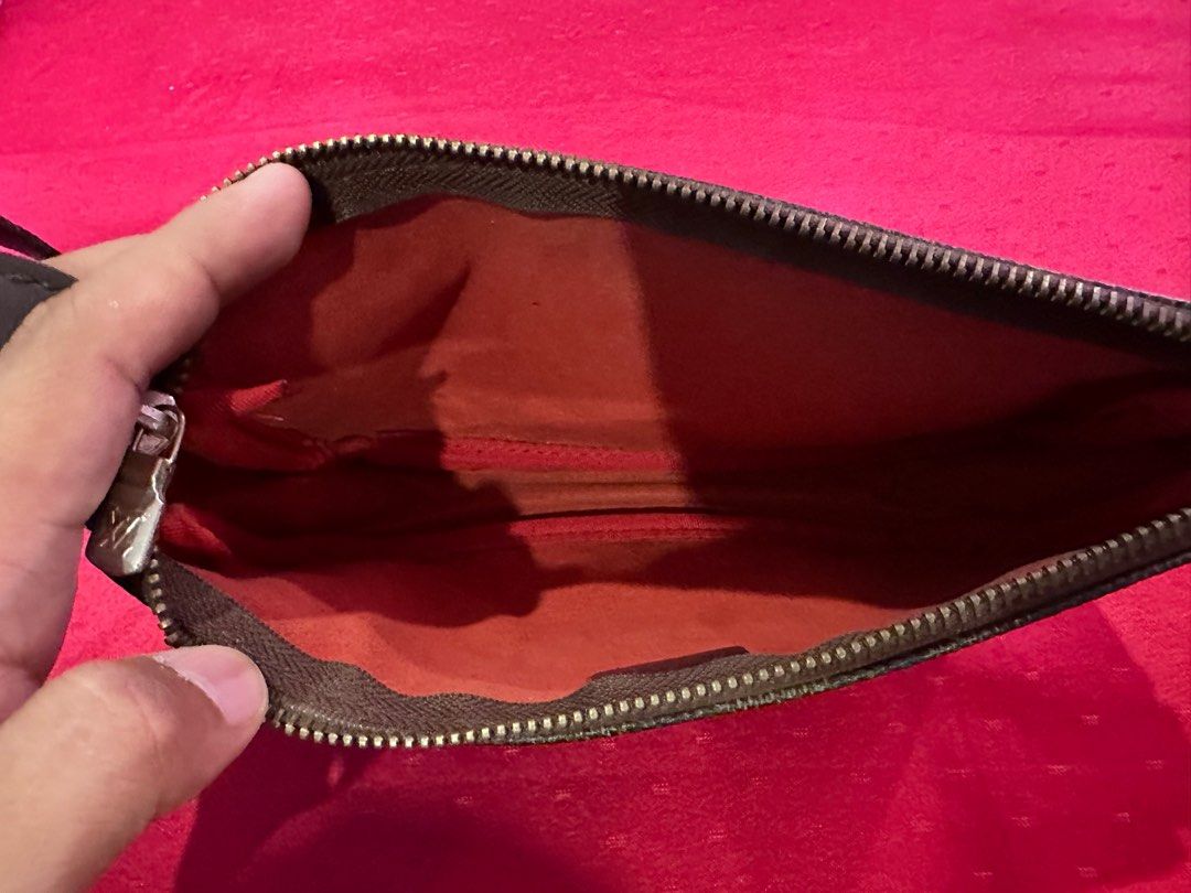 Louis Vuitton Pochette (Category: Luxury Bags & Wallets) located in Caloocan City. Submitted by frostymmer (Listing ID 1298346257, Image 2). Description: Louis Vuitton Pochette - 950 Please self authenticate. LV Neverfull with Pouch - Php 2100 Take both for Php 2,700.
