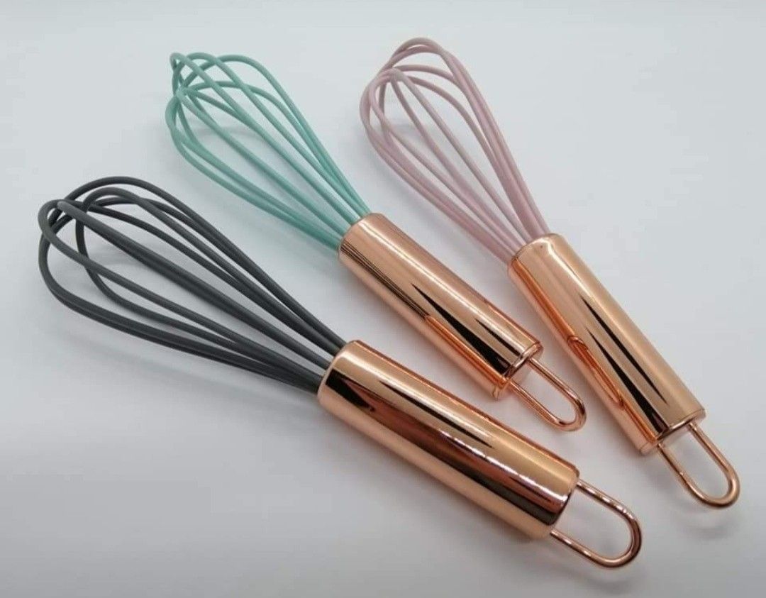 Mini Stainless steel & silicone wire whisk (Category: Bakeware) located in Paranaque City. Submitted by missteks1016 (Listing ID 1298298374, Image 1). Description: comes in 3 colors: pastel pink, pastel green & grey size : 7 inches.