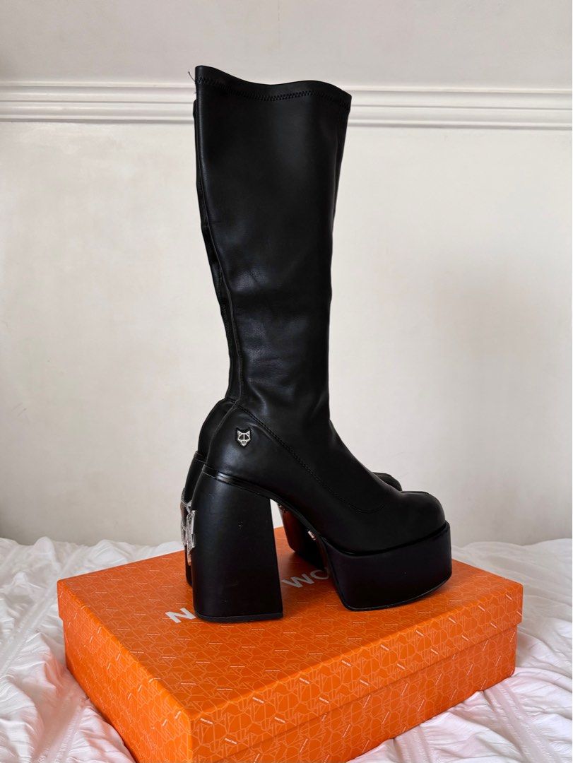 Naked Wolfe Black Spice Knee High Stretch Platform Boots (Category: Boots) located in Calamba. Submitted by dr.kiwi (Listing ID 1298358970, Image 1). Description: Last price posted and for sure buyers only! 🍒Retails for 19,894php 🍒Condition: 8/10 used a few times but has some minor flaws as seen on the pic 🍒Inclusions: Original box + dust bags 🍒Reason for selling: I'm too tall already 🍒Womens size 9 / 25.5cm.