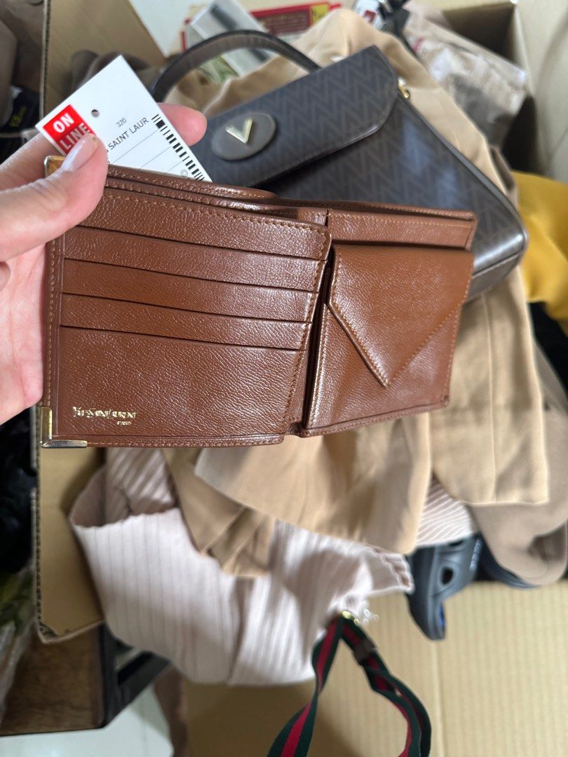 ORIG YSL bi fold wallet (Category: Luxury Bags & Wallets) located in Manila. Submitted by raila.bags (Listing ID 1298397822, Image 3). Description: ORIG ysl bi fold wallet no flaws .