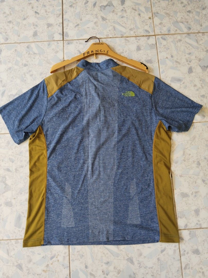 TNF Quick dry half zip t shirt (Category: Activewear) located in Barili. Submitted by francis88z (Listing ID 1298404444, Image 3). Description: TNF half zip t shirt size XXL fit to XL W22 L29 as new condition no issue.