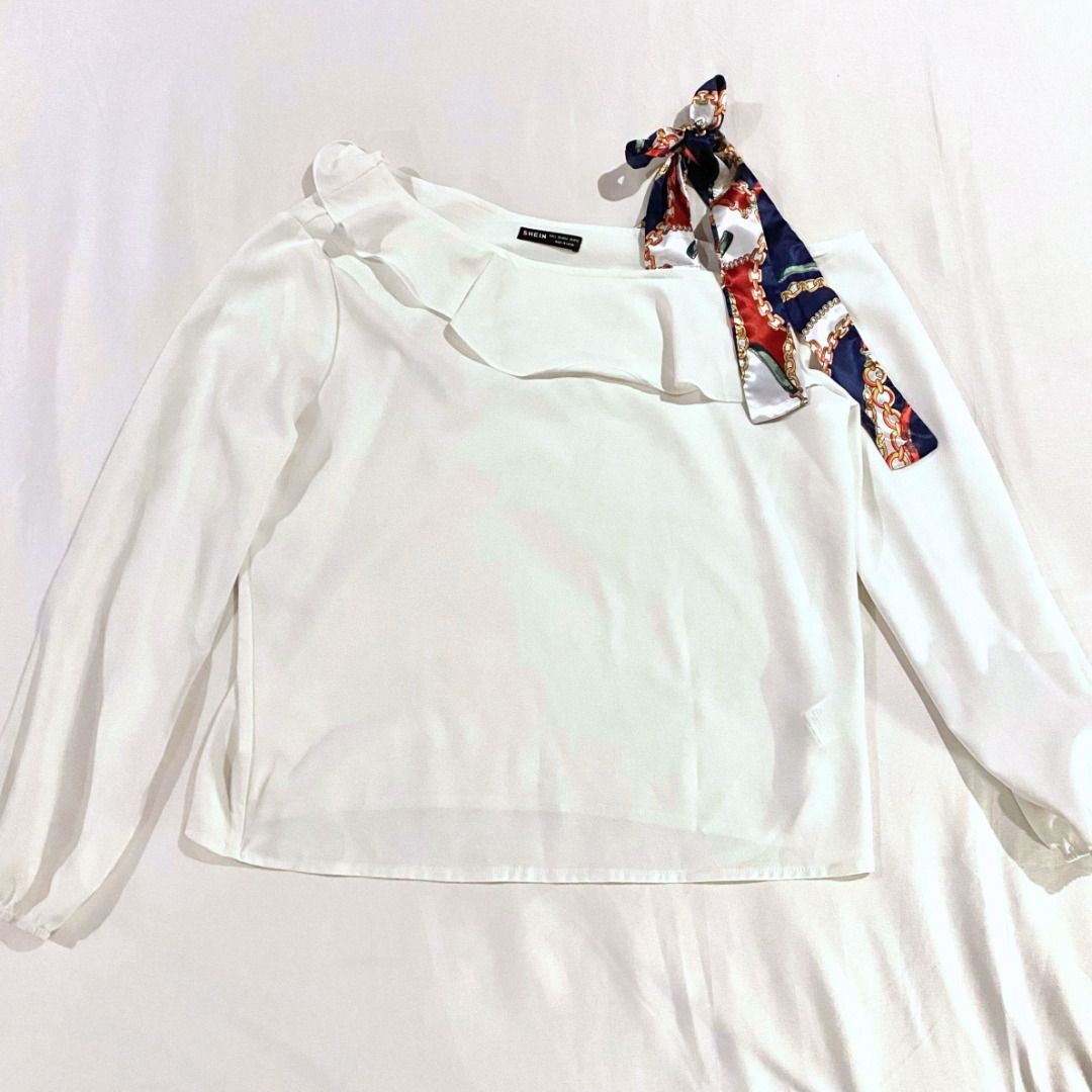 White Asymmetrical Long-sleeved Blouse with Tie (Category: Longsleeves) located in Makati City. Submitted by sofbetes (Listing ID 1298432407, Image 1). Description: Size: M-L Material: Polyester - Flowy, loose RFS: Decluttering 💲 MOP: Gcash, BDO/BPI Bank Transfer 📦 Delivery: GrabExpress, Lalamove ⌛️ Shipping: Within 1-3 days.