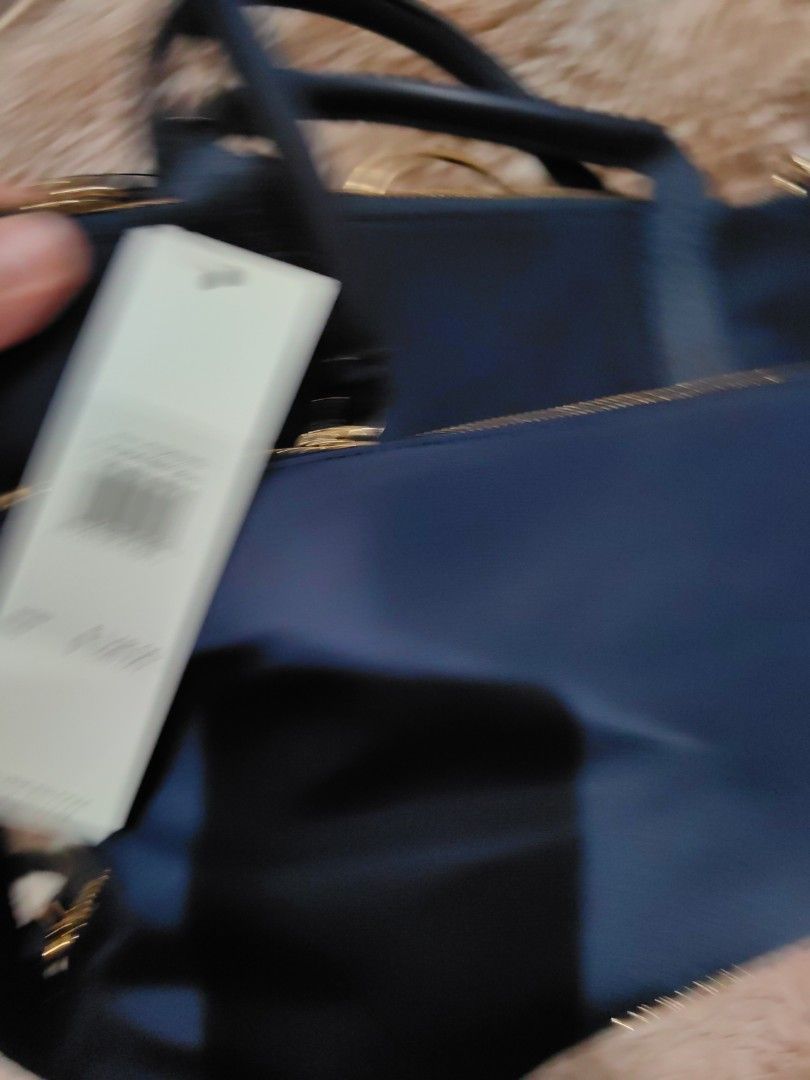 3 way bag (Category: Shoulder Bags) located in Quezon City. Submitted by finds_stuff (Listing ID 1298595581, Image 3). Description: Material : nylon Can be worn several ways: backpack, shoulder bag, crossbody bag Issue: missing 1 strap Color: navy.