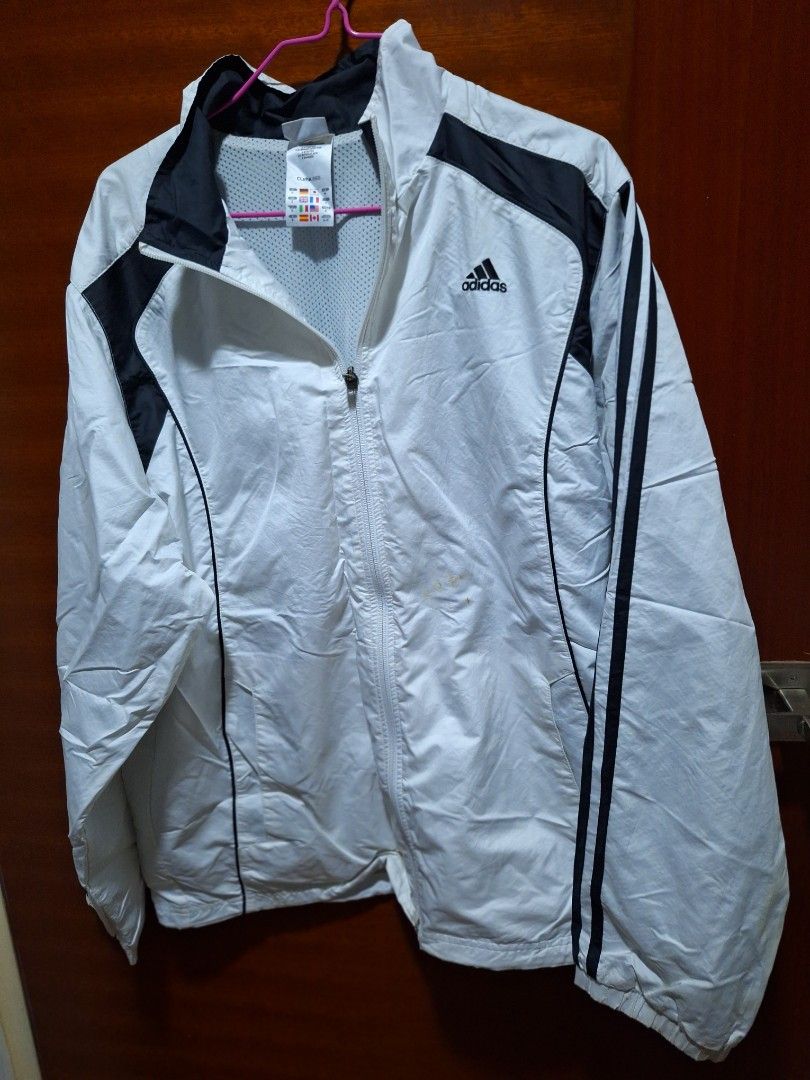 Adidas White Jacket (Category: Coats, Jackets and Outerwear) located in Singapore. Submitted by best_deals_888 (Listing ID 1298607222, Image 3). Description: some stains developed after kept too long which I believe can be removed after washing..