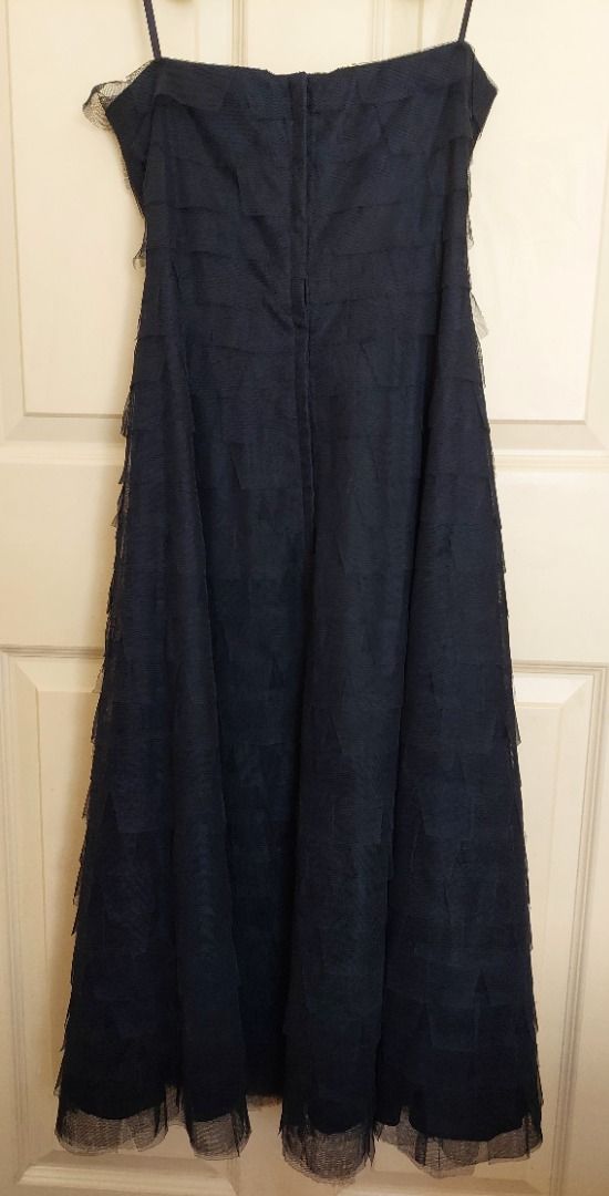 BCBG Max Azria black strapless gown S-M (Category: Evening dresses & gowns) located in Antipolo. Submitted by cychiyo (Listing ID 1298570833, Image 3). Description: BCBG Max Azria strapless black gown with boning in the bust area (see last photo) back zipper excellent fit and condition true black (photo shot in-camera just automatically makes it lighter, so it comes out greyish) brand new without tag already dry-cleaned; ready to wear length: inc
