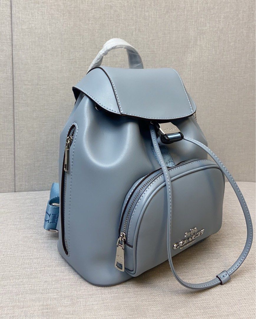 coach backpack under 100 Outlet Court In Signature Canvas Refined pebble leather Inside multifunction pocket Zip closure fabric lining Top handle with 2 1/2 drop Outside zip pocket Adjustable shoulder strap for crossbody wear 6 (L) x 8 (H) x 3 (W) Mickey Mouse character COACH Outlet Tyler Backpack -
