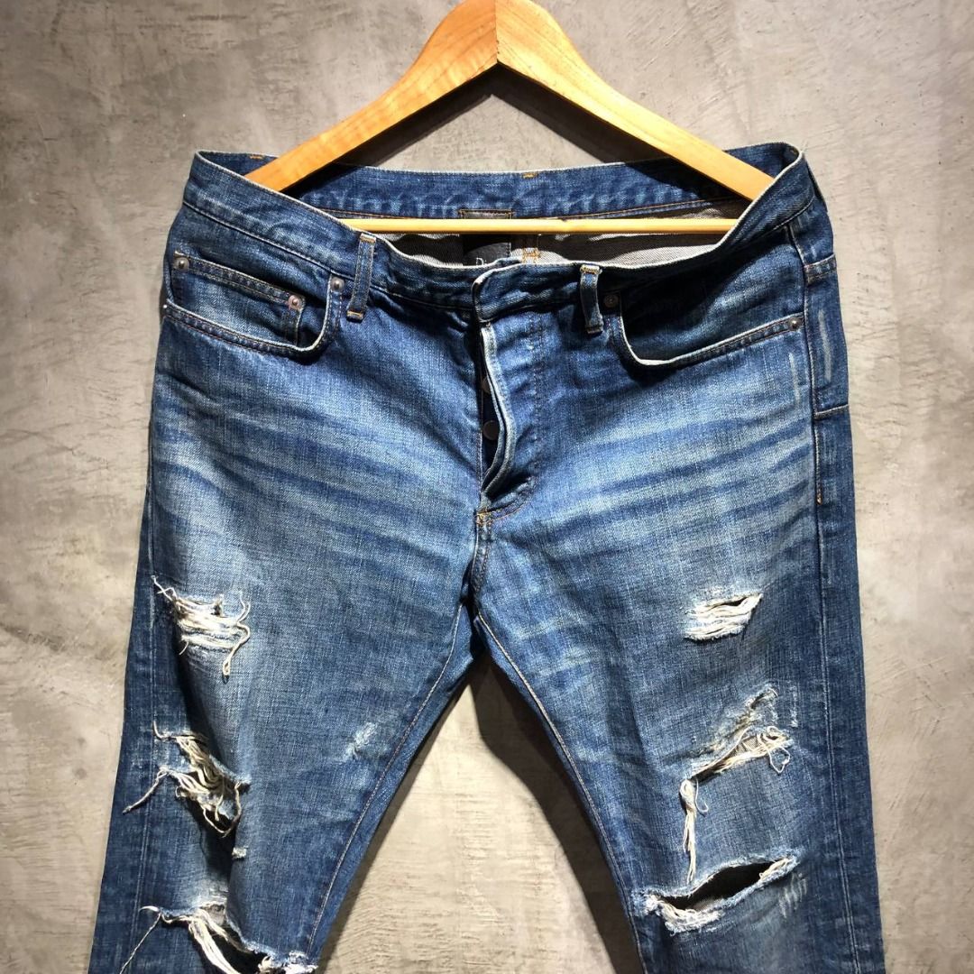 Dior Homme Tattered Denim pants (Category: Luxury Apparel) located in Quezon City. Submitted by johnpaulperezzz (Listing ID 1298521283, Image 2). Description: NAME: Dior Homme Tattered Denim pants COLOR: denim SIZE: 32 FIT: 33 Dimension: Waist: 16-17 Inseam: 30 Front Rise: 10 Thigh: 9 Knee: 8 Leg Opening: 6 CONDITION: 9/10 ISSUE: -none PRICE: 9k .