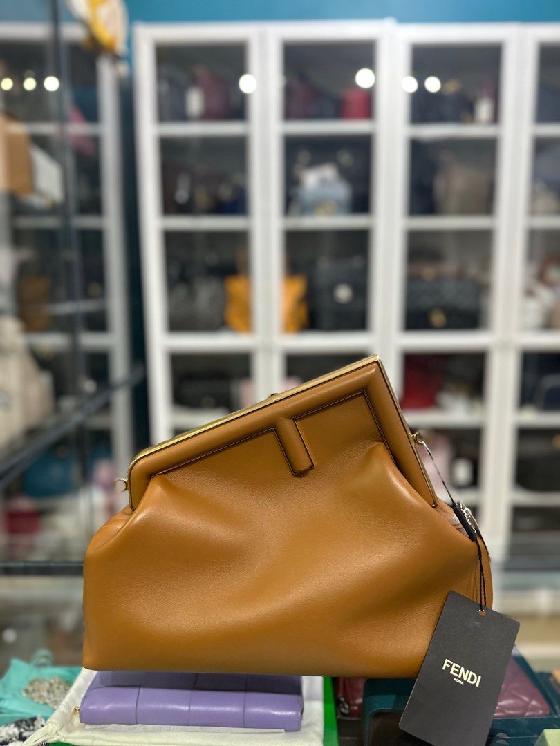 Fendi First Medium in Caramel Nappa Bag (Category: Luxury Bags & Wallets) located in Taguig. Submitted by closetcompany (Listing ID 1298588350, Image 1). Description: Fendi First Medium in Caramel Nappa Bag 🫧Php 165,000 🫧CONDITION: Unused (new) 🫧RATING: 10/10 🫧INCLUSIONS: dust bag, detachable strap, tag and Entrupy certificate 🫧Modes of Payment: Cash BDO credit card (Up to 12 mos installment with interest) Layaway Paypal Accepted Bank Transf