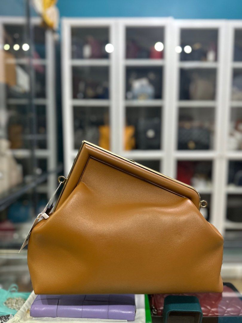 Fendi First Medium in Caramel Nappa Bag (Category: Luxury Bags & Wallets) located in Taguig. Submitted by closetcompany (Listing ID 1298588350, Image 3). Description: Fendi First Medium in Caramel Nappa Bag 🫧Php 165,000 🫧CONDITION: Unused (new) 🫧RATING: 10/10 🫧INCLUSIONS: dust bag, detachable strap, tag and Entrupy certificate 🫧Modes of Payment: Cash BDO credit card (Up to 12 mos installment with interest) Layaway Paypal Accepted Bank Transf
