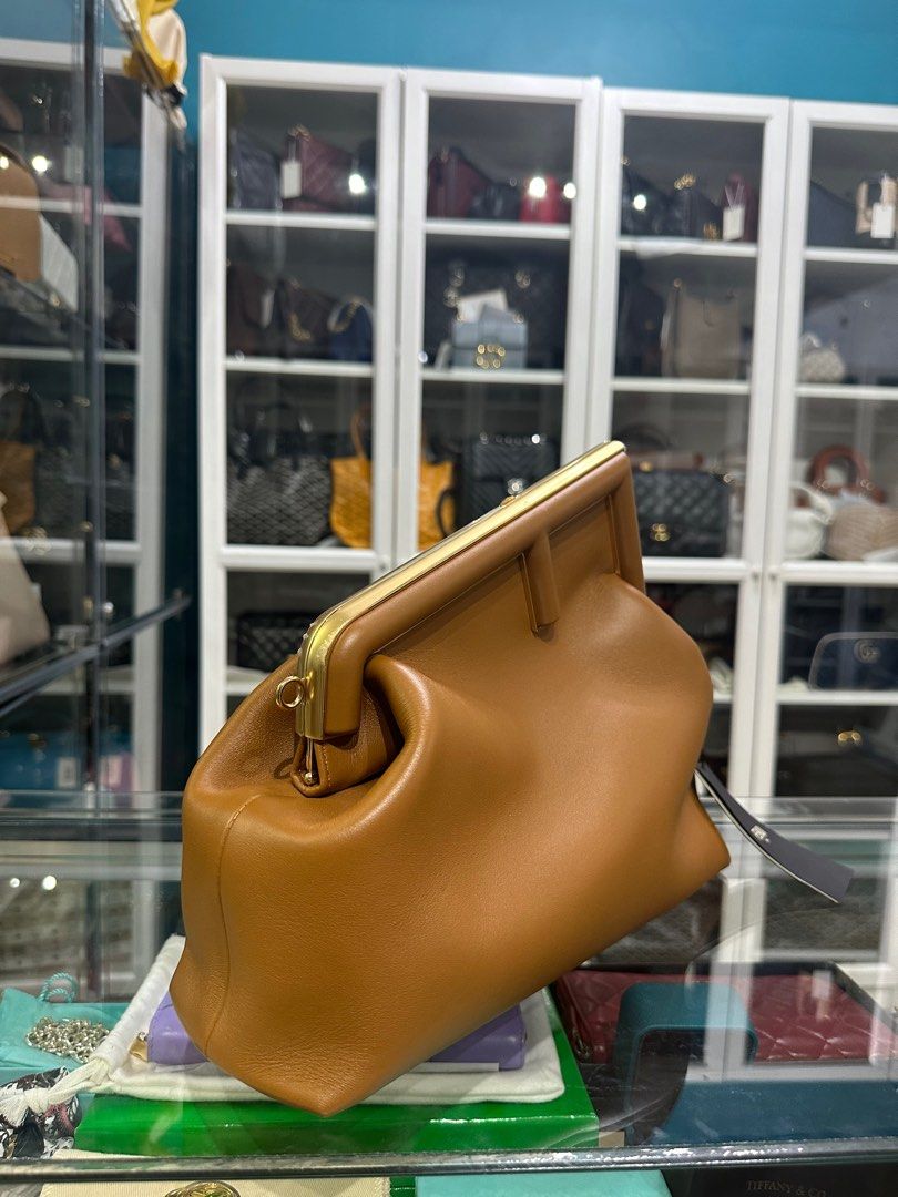 Fendi First Medium in Caramel Nappa Bag (Category: Luxury Bags & Wallets) located in Taguig. Submitted by closetcompany (Listing ID 1298588350, Image 2). Description: Fendi First Medium in Caramel Nappa Bag 🫧Php 165,000 🫧CONDITION: Unused (new) 🫧RATING: 10/10 🫧INCLUSIONS: dust bag, detachable strap, tag and Entrupy certificate 🫧Modes of Payment: Cash BDO credit card (Up to 12 mos installment with interest) Layaway Paypal Accepted Bank Transf