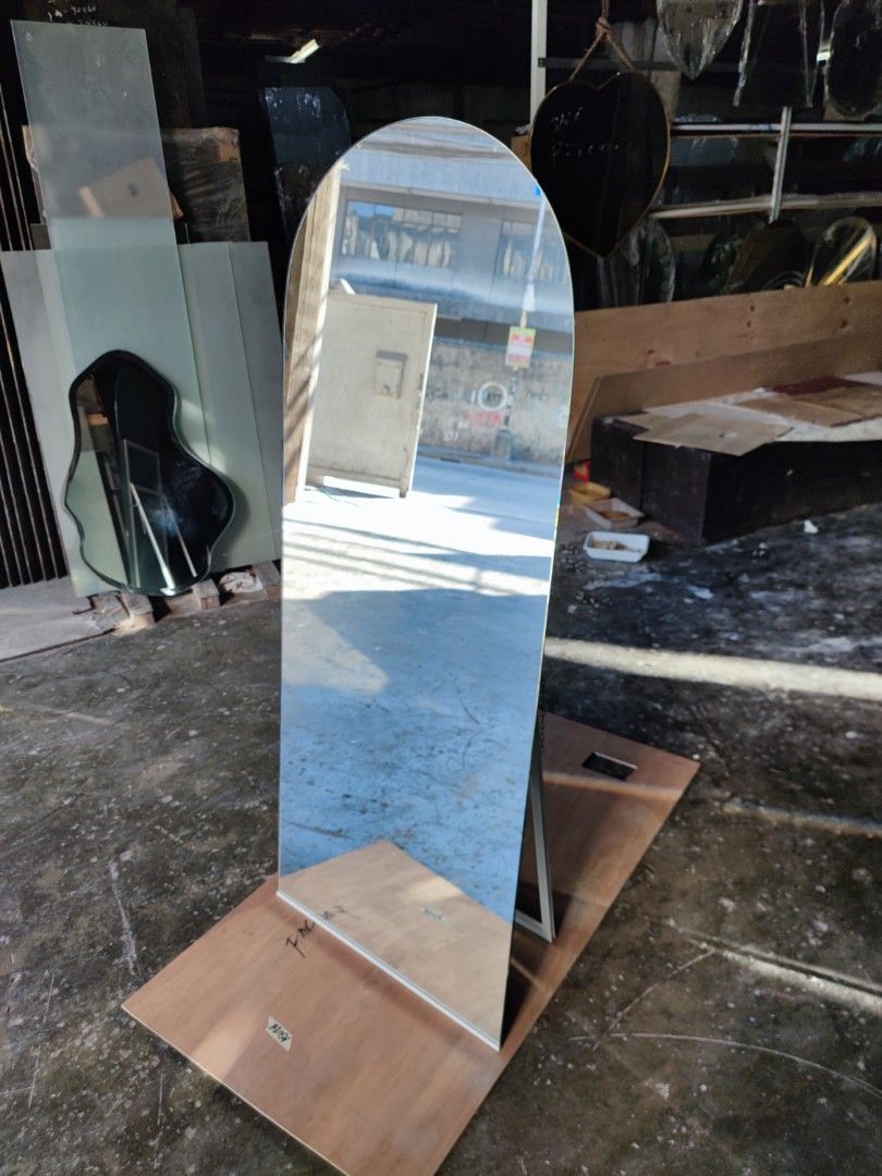 Frameless arc mirror with back stand (Category: Mirrors) located in Malabon City. Submitted by mirrors.ph (Listing ID 1298597702, Image 2). Description: Frameless arc mirror using 6mm thick copper free mirror polished edges with back stand Size: 2ft x 5ft P2800.