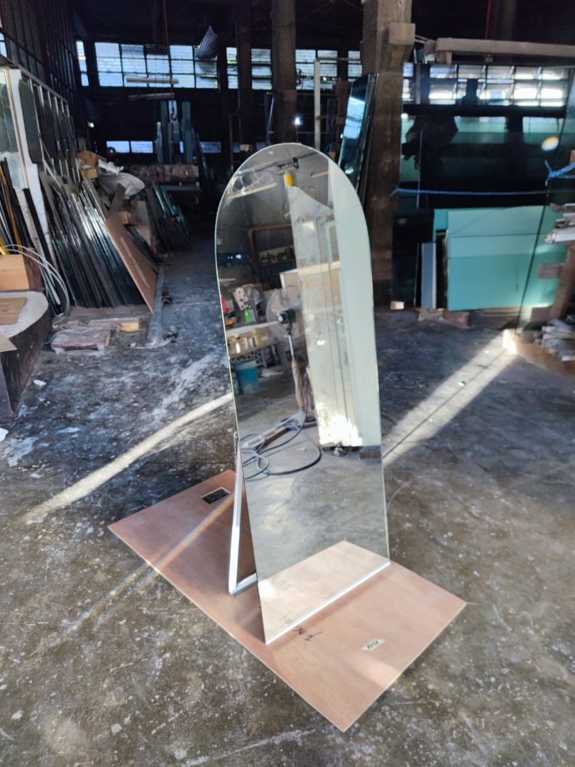 Frameless arc mirror with back stand (Category: Mirrors) located in Malabon City. Submitted by mirrors.ph (Listing ID 1298597702, Image 3). Description: Frameless arc mirror using 6mm thick copper free mirror polished edges with back stand Size: 2ft x 5ft P2800.