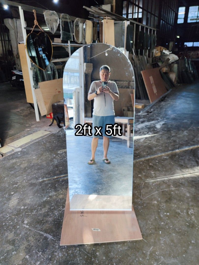 Frameless arc mirror with back stand (Category: Mirrors) located in Malabon City. Submitted by mirrors.ph (Listing ID 1298597702, Image 1). Description: Frameless arc mirror using 6mm thick copper free mirror polished edges with back stand Size: 2ft x 5ft P2800.