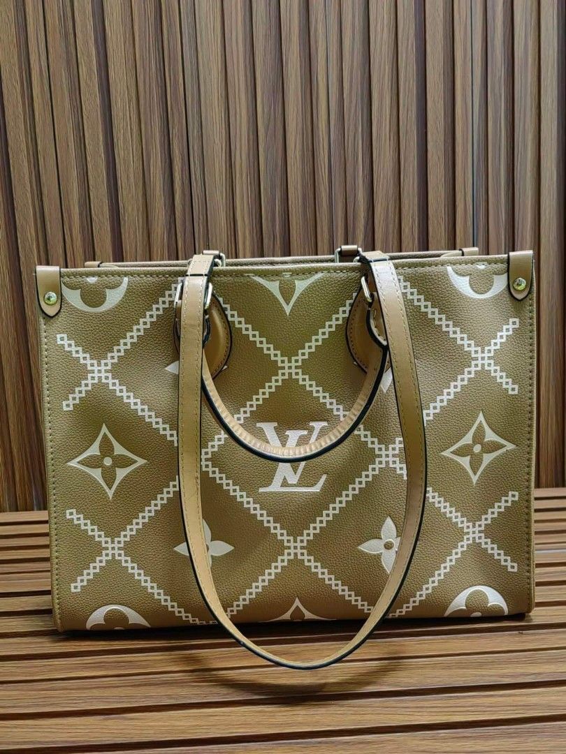 Lv Tote OTG (Category: Luxury Bags & Wallets) located in Cebu City. Submitted by day.98 (Listing ID 1298569569, Image 2). Description: japan preloved selected from japan surplus genuine leather embossed leather coded meduim size no flaws.