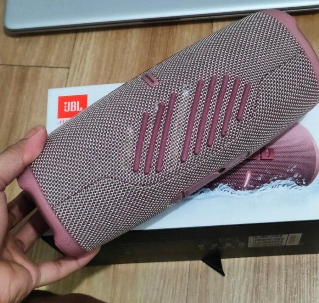 JBL Harman Charge 5 Bluetooth Speaker (Wireless) (Category: Soundbars, Speakers & Amplifiers) located in Pasig City. Submitted by igustnik (Listing ID 1298585080, Image 2). Description: WHAT YOU SEE IS WHAT YOU'LL GET BAWAL SA MAARTE BUT FOR ME, QUALITY IS STILL GOOD FOR MAAARTE ACTUAL PHOTOS POSTED FLAWS SEEN ON PICTURES NO ISSUE/S; WORKS 100% FINE WITH BOX AND COMPLETE MANUALS PATI ATA PAPER BAG NAITABI KO PA, MAY MGA SULAT-SULAT LANG NO CHARGE