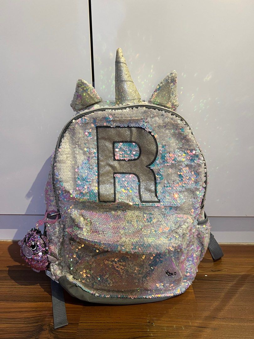 Justice backpacks with letter r top