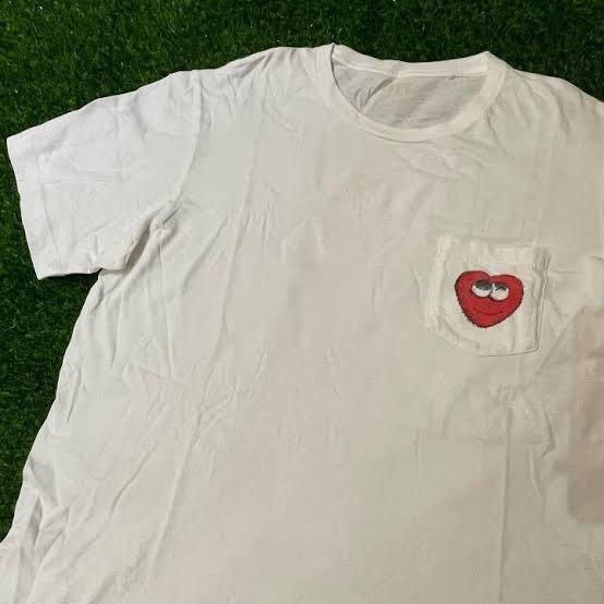 Kaws heart pocket tee (Category: Tshirts & Polo Shirts ) located in San Fernando. Submitted by random.goods.ph (Listing ID 1298513802, Image 2). Description: Well used Size xl Faded size tag 8/10.