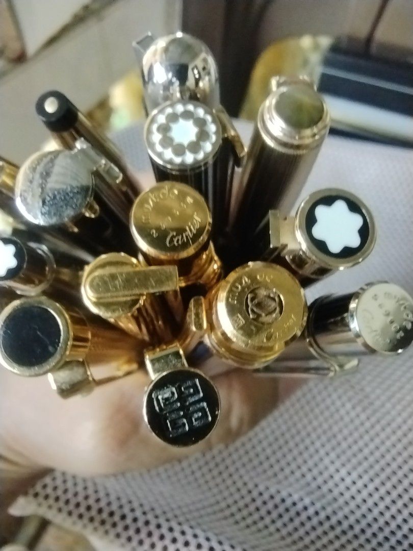 Vintage Luxury Pen (Category: Luxury Accessories) located in Daet. Submitted by fryzoneshop (Listing ID 1298487021, Image 1). Description: Vintage & antique Luxury pen all in good to excellent condition 1. Les Must De Cartier Fountain pen – (nib was replaced ) P14,875 2. Le must De Cartier Ballpoint pen silver color P11,950 3. Le must De Cartier Ballpoint pen Black Gold Trim P11,950 4. St. Dupont ballpoint pen Classic gold plated P8,900 5. Parker