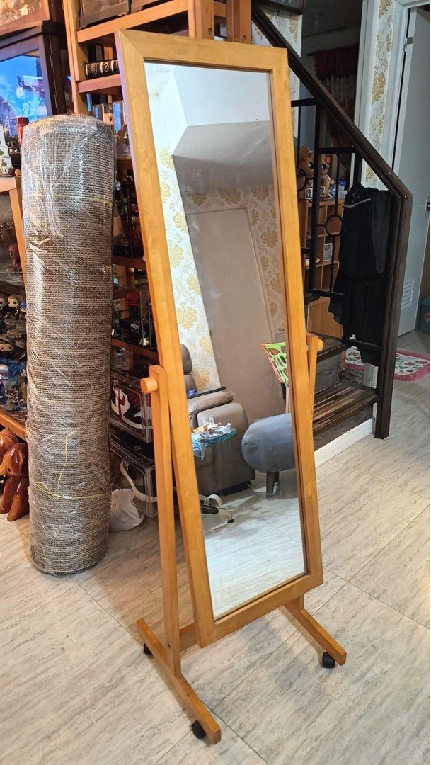 Floor mirror (Category: Mirrors) located in Quezon City. Submitted by matetdevis13 (Listing ID 1298655447, Image 1). Description: Solid wood mobile floor mirror Price : 3000 18L x 15W x 57H inches In good condition Code rusdha.