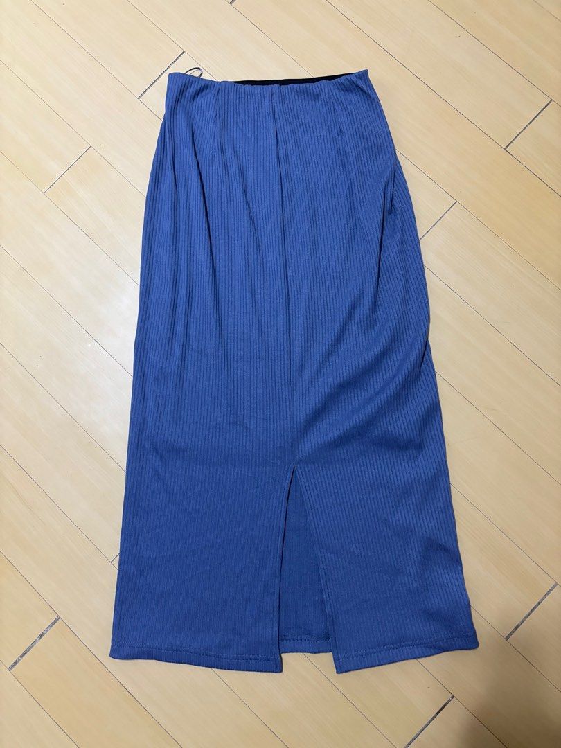 GU blue maxi skirt (Category: Skirts) located in General Trias. Submitted by leyarg (Listing ID 1298781242, Image 3). Description: Size 24-30 laid flat garter is not loose Length is 33 in Slit on the back Thick fabric and have inner lining.