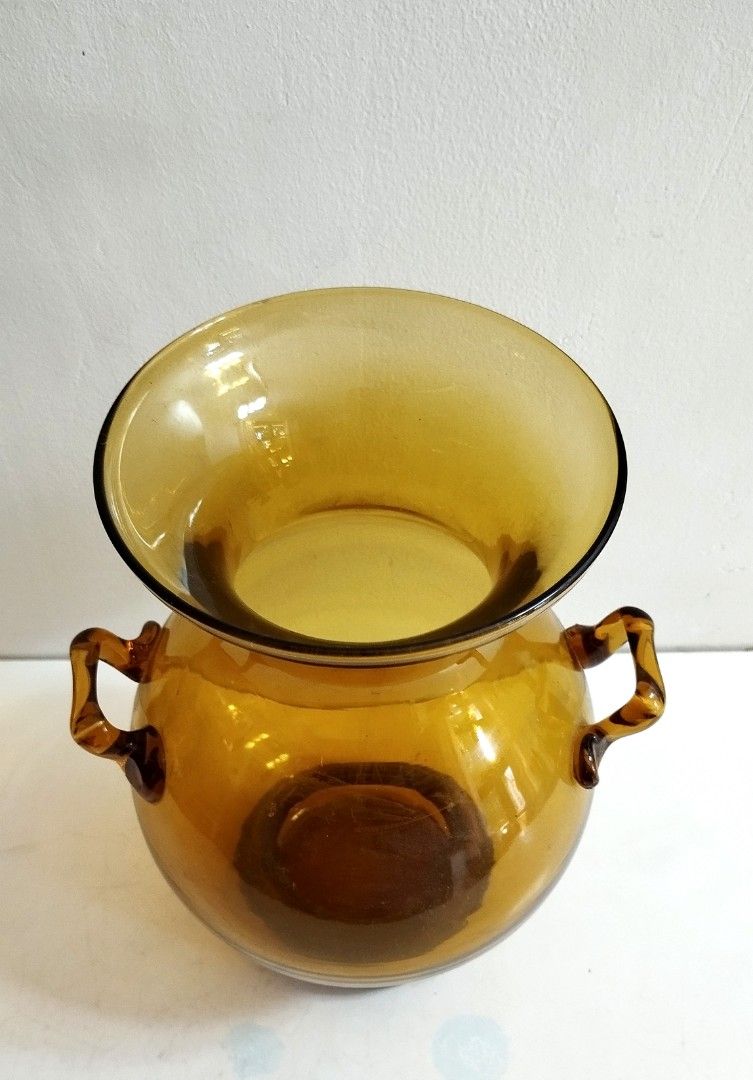 Amber Art Glass Vase (Category: Vases & Decorative Bowls) located in Marikina City. Submitted by macy_1024 (Listing ID 1298827831, Image 3). Description: Height: 9" Circumference: 18" With minimal flaw, see last picture..