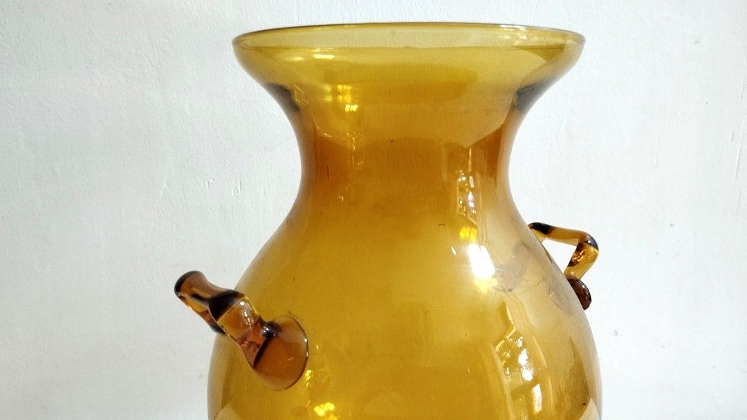 Amber Art Glass Vase (Category: Vases & Decorative Bowls) located in Marikina City. Submitted by macy_1024 (Listing ID 1298827831, Image 2). Description: Height: 9" Circumference: 18" With minimal flaw, see last picture..