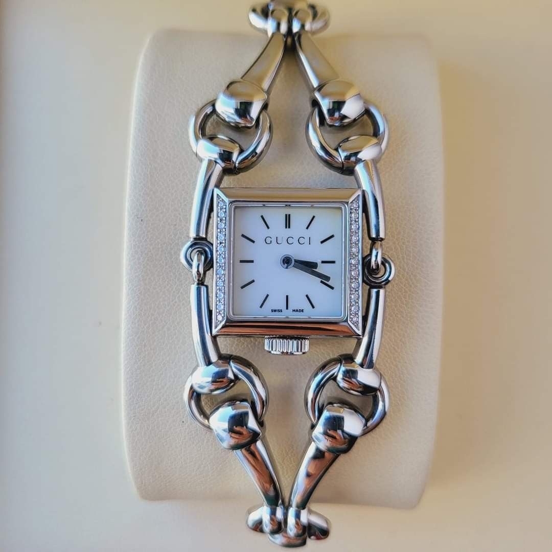Authentic Gucci Signoria Diamond bezel mother of pearl dial watch for women